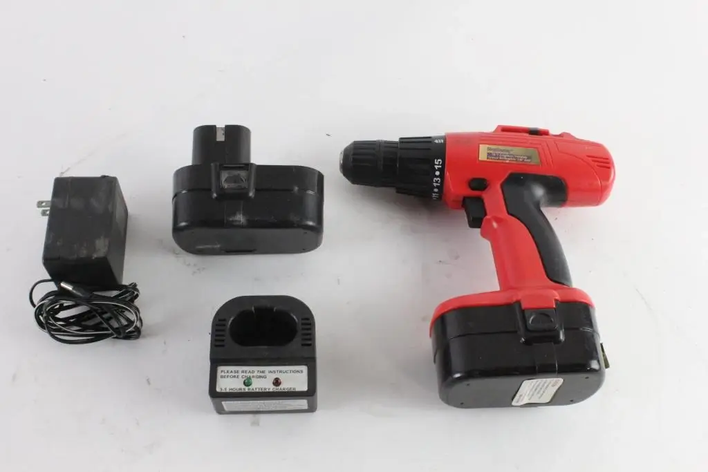 A cordless drill with battery and charger kit